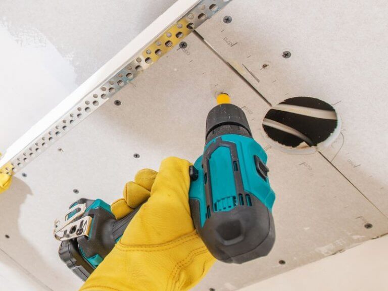 How Deep Should Drywall Screws Go Into Studs? ToolsOwner