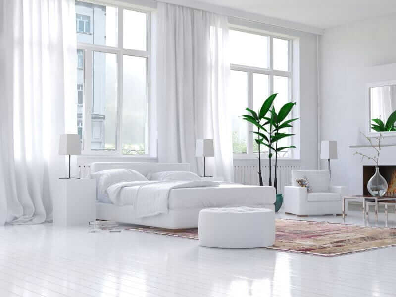 What Is The Proper Way To Put A Rug Under A Bed?